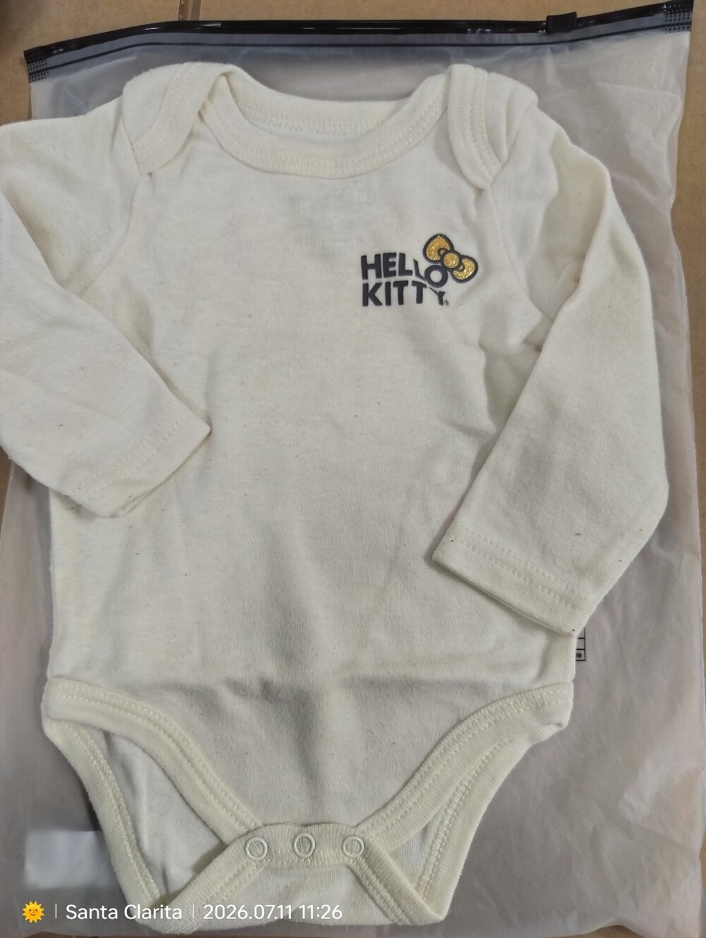 Hello Kitty Cream Long-Sleeve Baby Bodysuit- Bundle Of 8 Items